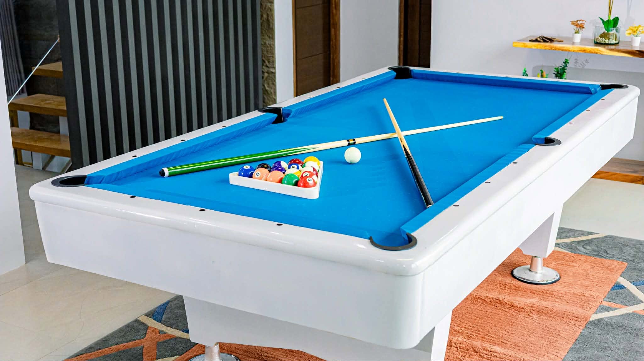 Blue billiards table in the entertainment area